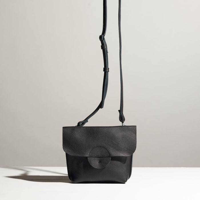 black leather cross body bag classy elegant artsy unique look made by hand in portland maine