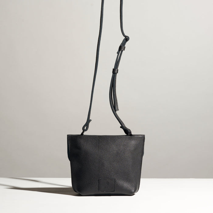 black leather cross body bag classy elegant artsy unique look made by hand in portland maine