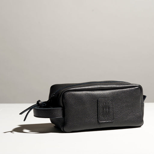 black leather dopp kit made. by hand in portland maine