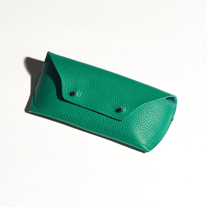 green turquoise lether glasses holder made by hand in portland maine