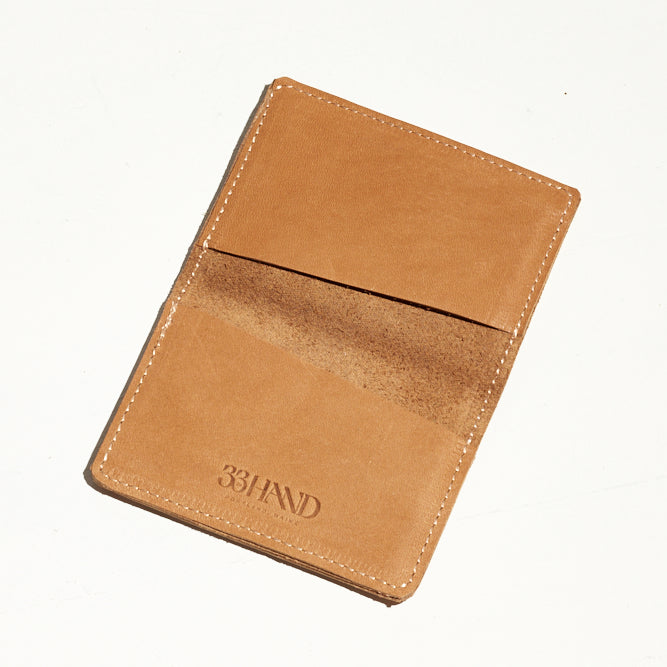 card holder wallet that can stretch to hold more in tan leather made in portland maine by hand