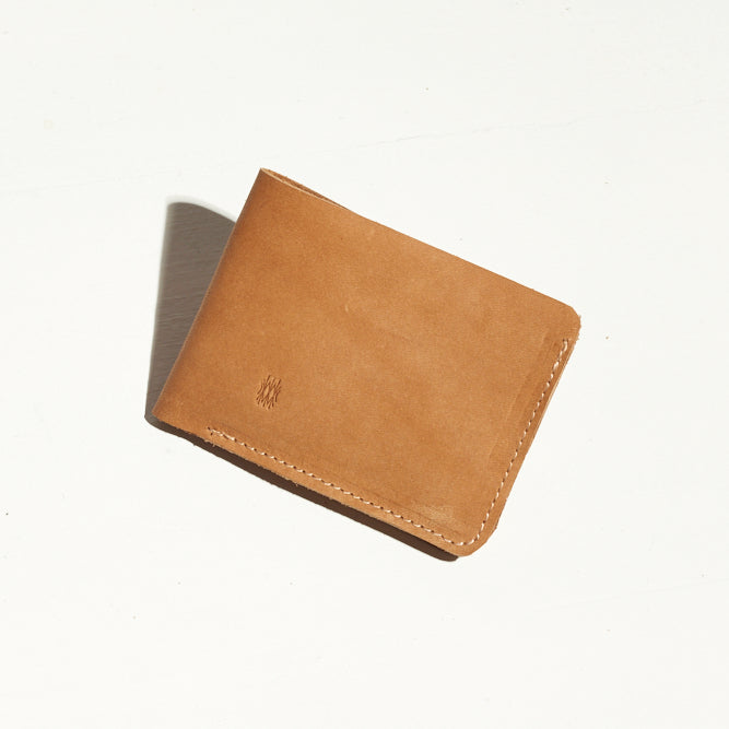 card holder wallet that can stretch to hold more in tan leather made in portland maine by hand