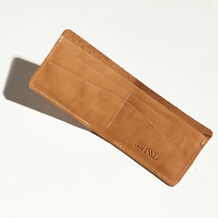 card holder wallet that can stretch to hold more in tan leather made in portland maine by hand