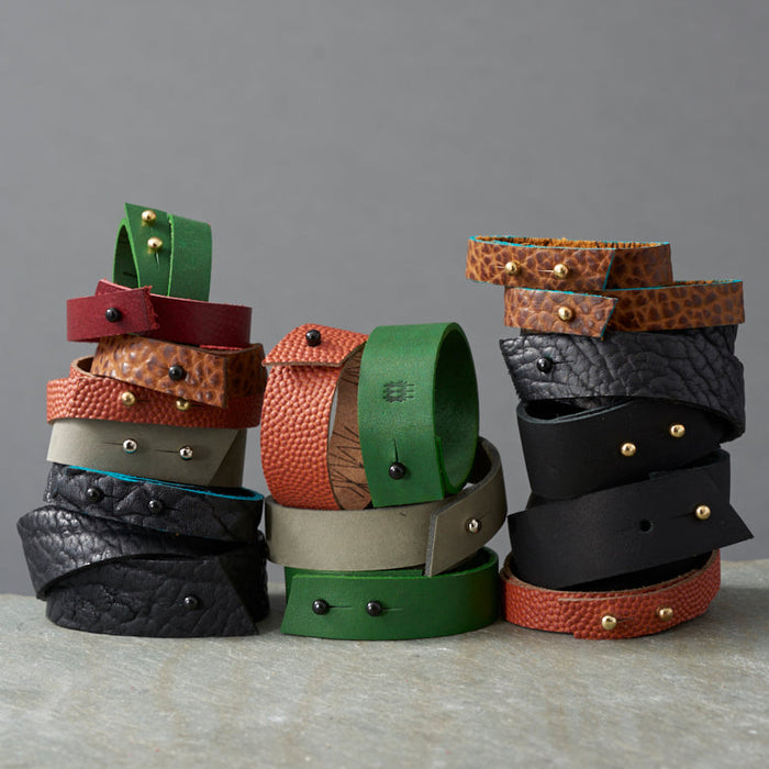 textured green blue tan grey black red leather bracelets made by hand in portland maine