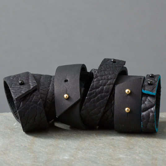 textured black leather bracelets made by hand in portland maine