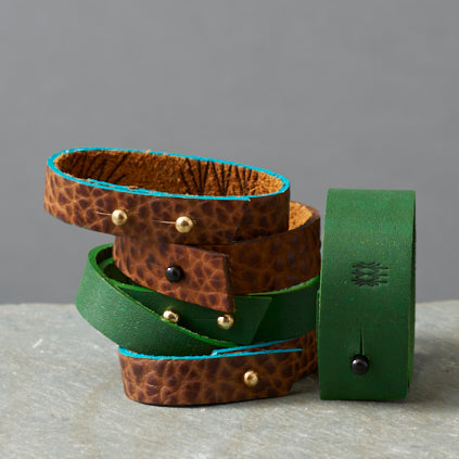 textured green blue tan leather bracelets made by hand in portland maine