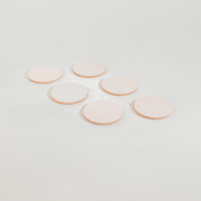 Kids jumping on outdoor stepping stones