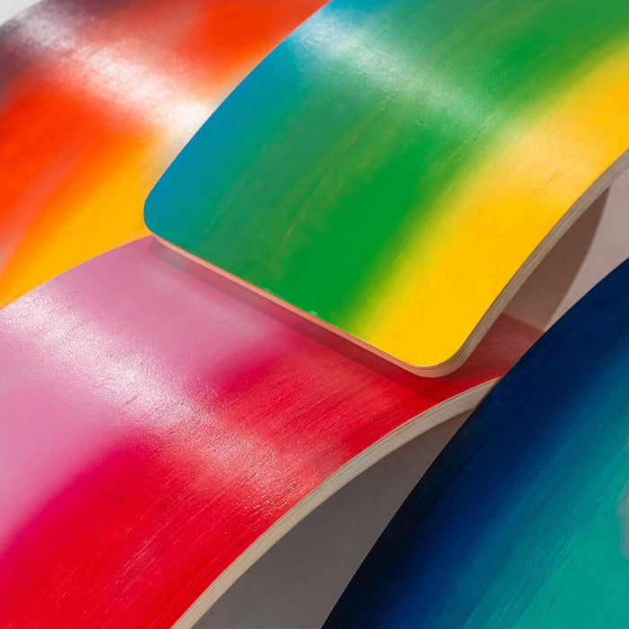 Child learning balance on wobble board