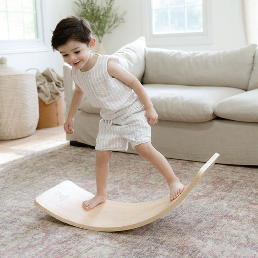 Kids playing with a wobble board
