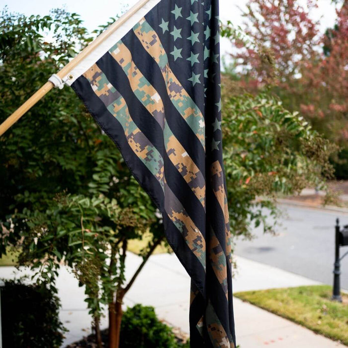 American flag made in the USA flying outside a home