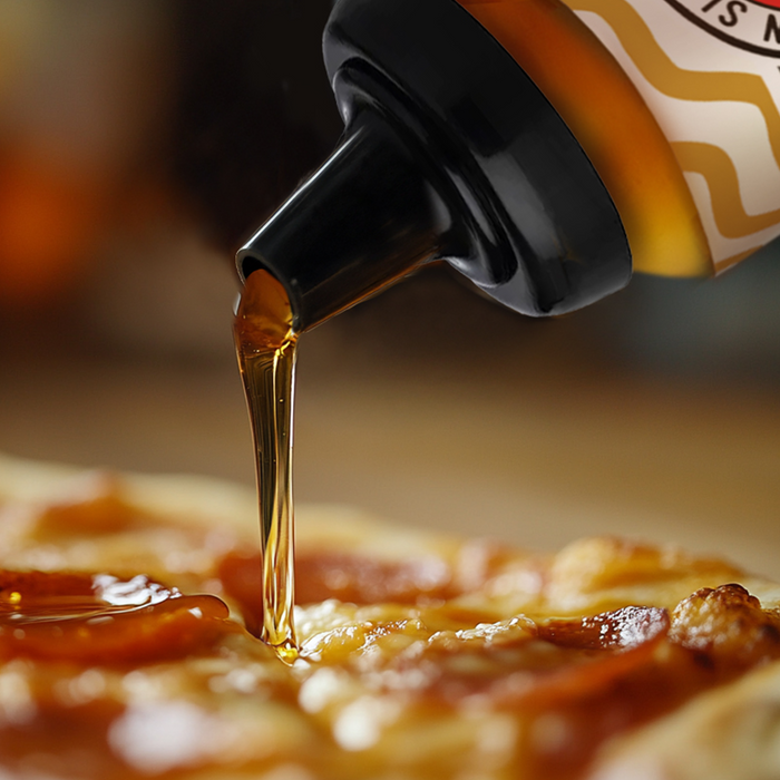 American-produced raw honey, creamed honey, hot honey, honeycomb and infused honey
