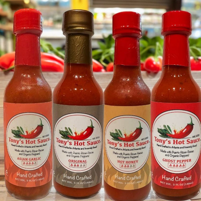 Assorted American-made hot sauces, BBQ sauces, marinades, mustards and condiments