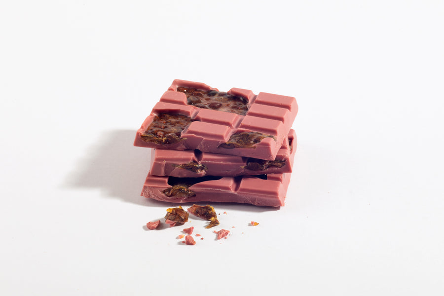 Stacked ruby chocolate cocoa nib brittle pieces