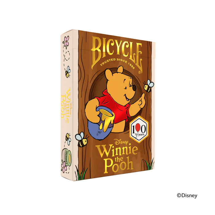 Bicycle Winnie the Pooh tuck with a tree-doorway illustration