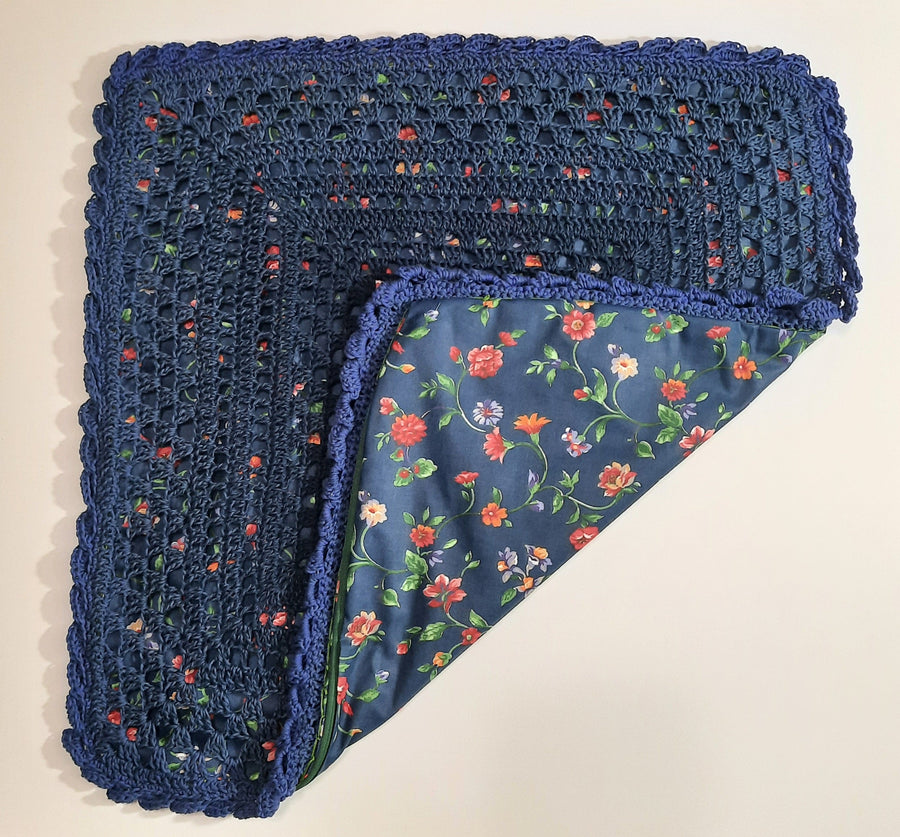 Blue & Violet Crochet Pillow Cover, folded cover showing blue floral reverse