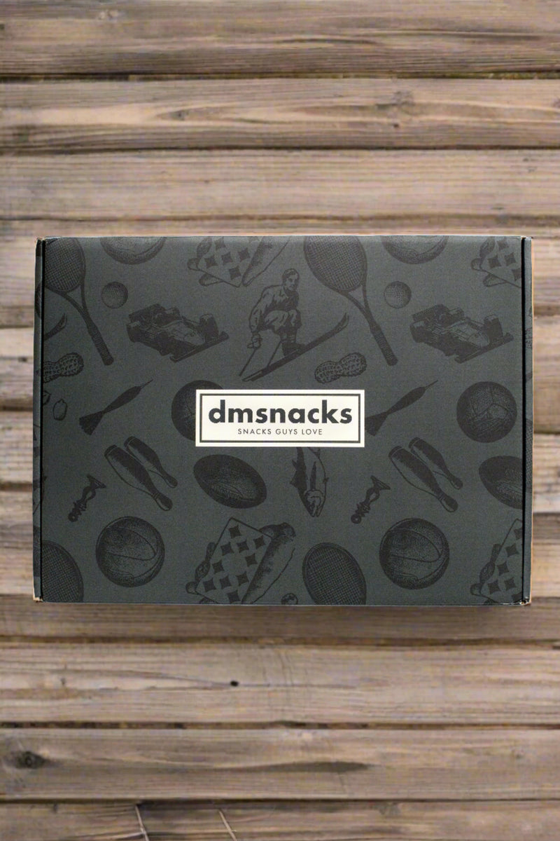 Vintage-themed Bar Cart Snacks case with nostalgic designs against a wooden background.