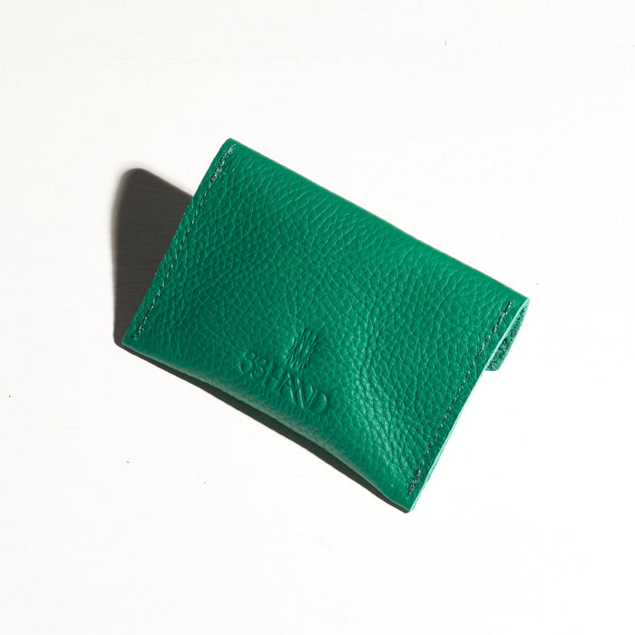 green turquoise leather small card wallet that stretches to fit more cards classy elegant artsy unique look made by hand in portland maine
