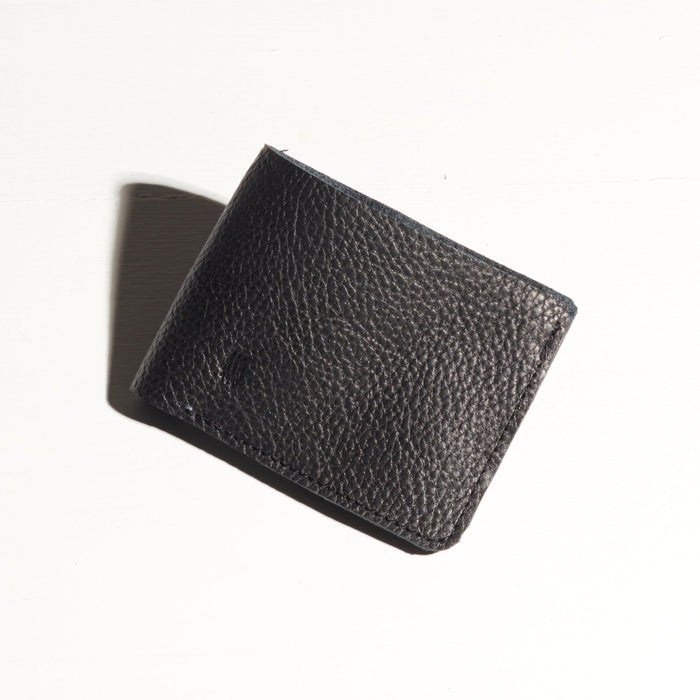 small leather coin purse card holder made by hand in portland maine