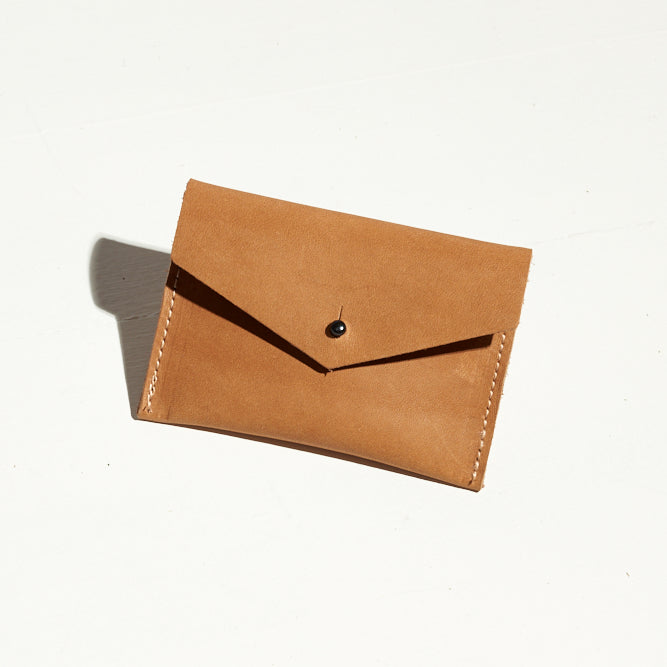 small, sleek tan leather card wallet 
