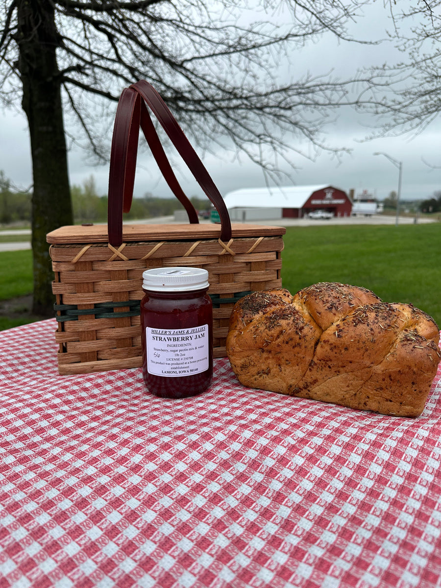 Miller’s Strawberry Jam 18 oz jar with ingredient and Lamoni, Iowa production label.