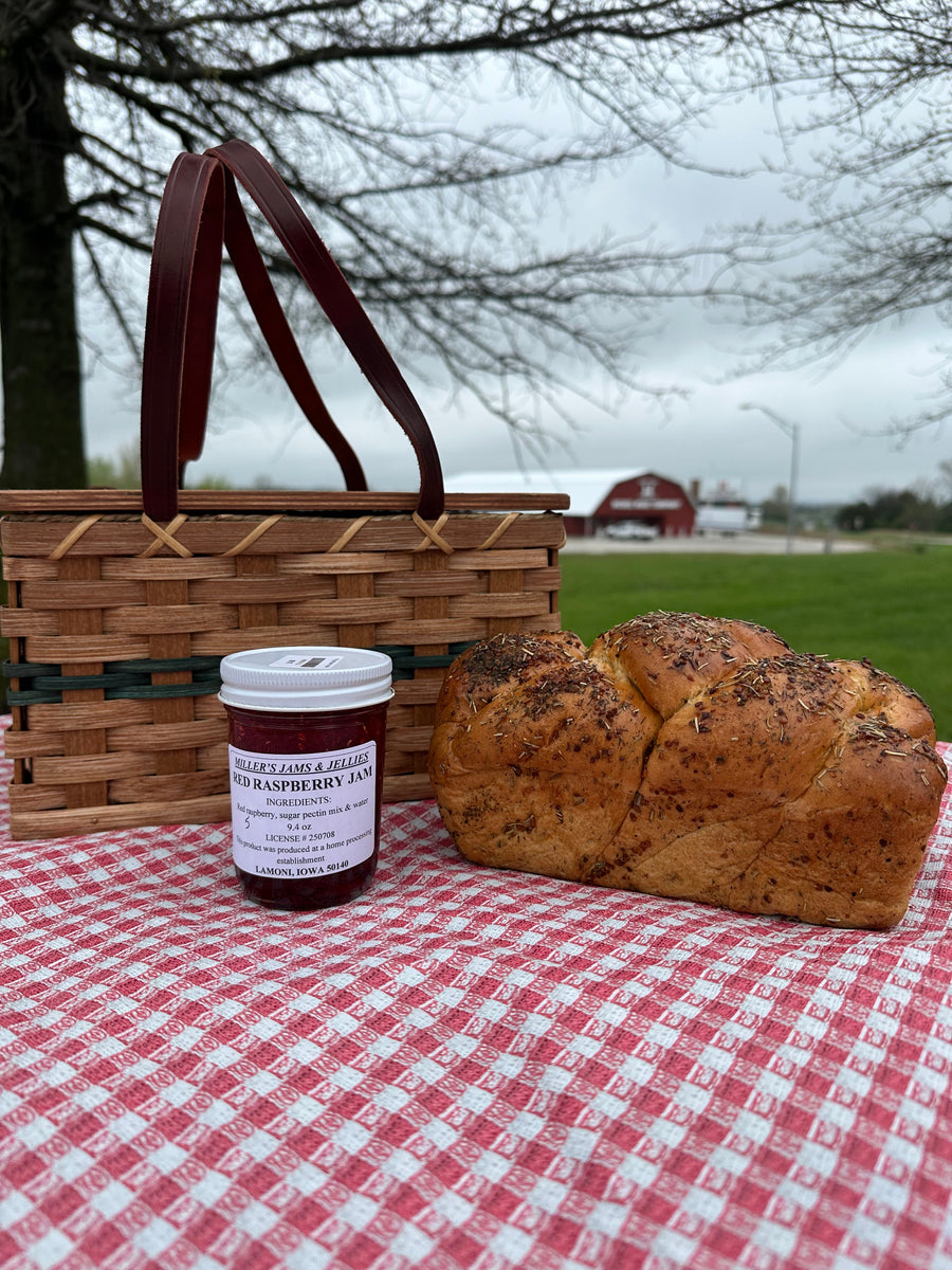Miller’s Red Raspberry Jam 9.4 oz jar showing its product label.
