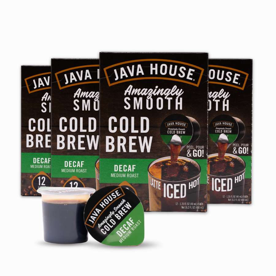 Decaf case cartons beside an open pod