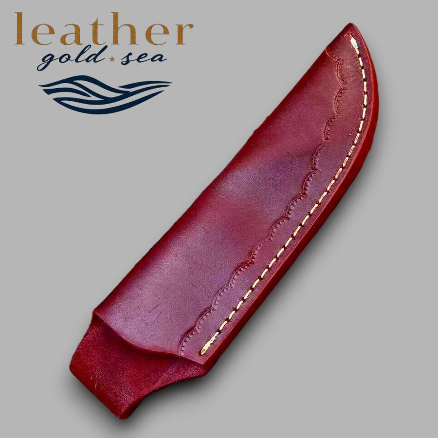Plain curved face of reddish-brown leather knife sheath