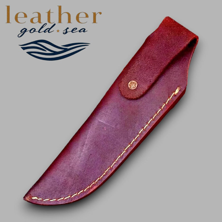 Rear snap strap on reddish-brown leather knife sheath