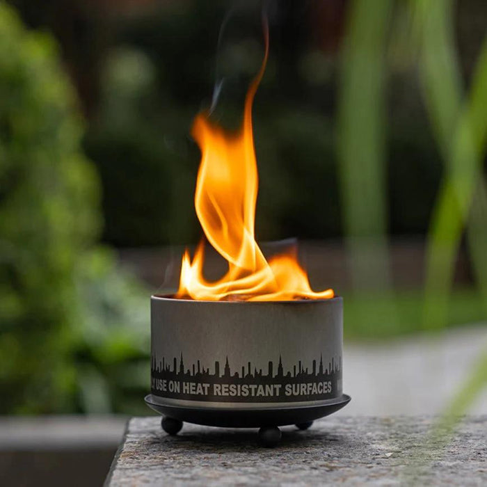 Lit original bonfire on an outdoor trivet
