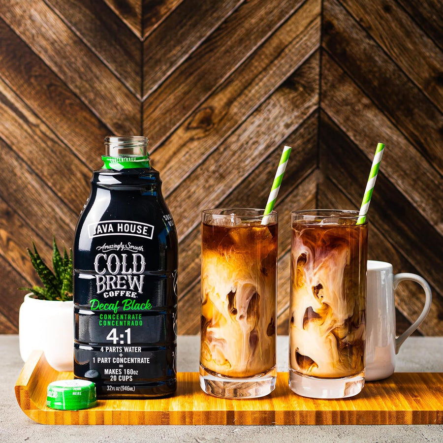 Decaf concentrate beside an iced latte
