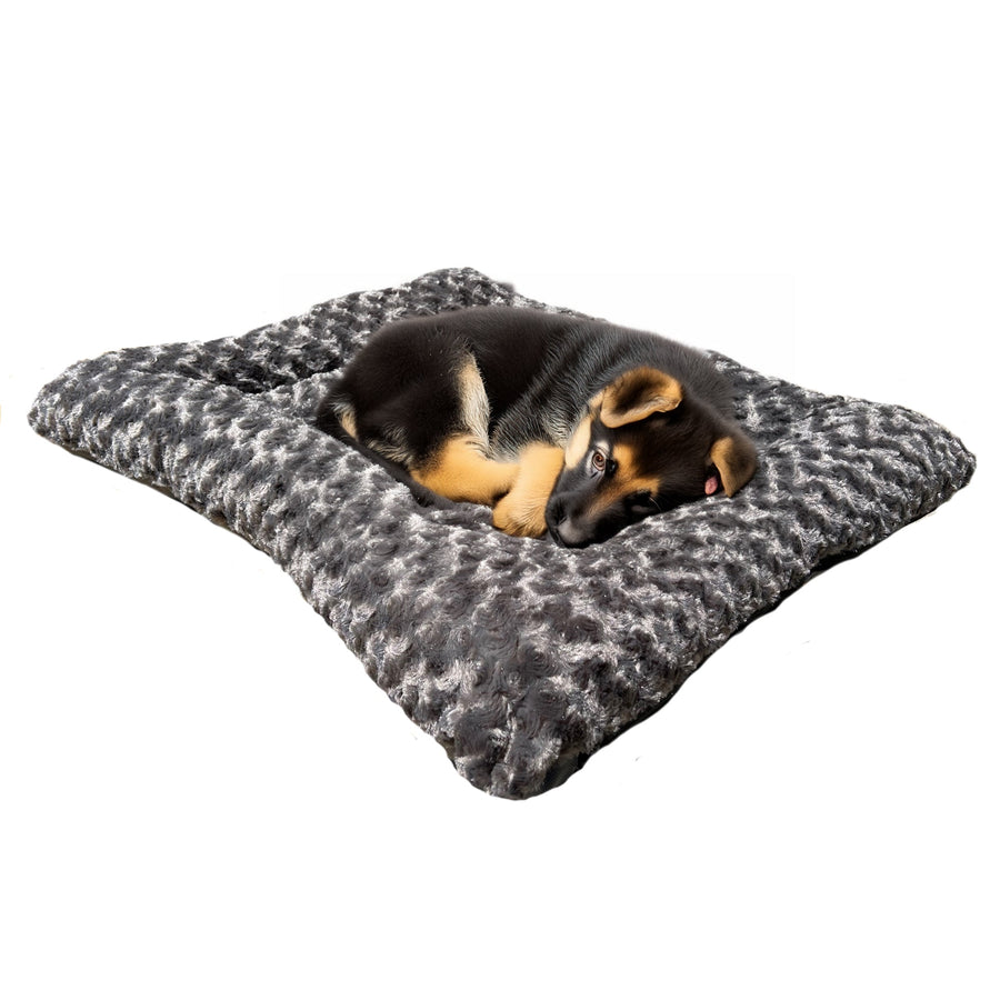 Puppy resting on a charcoal Cloud Furvana rectangle bolster dog bed