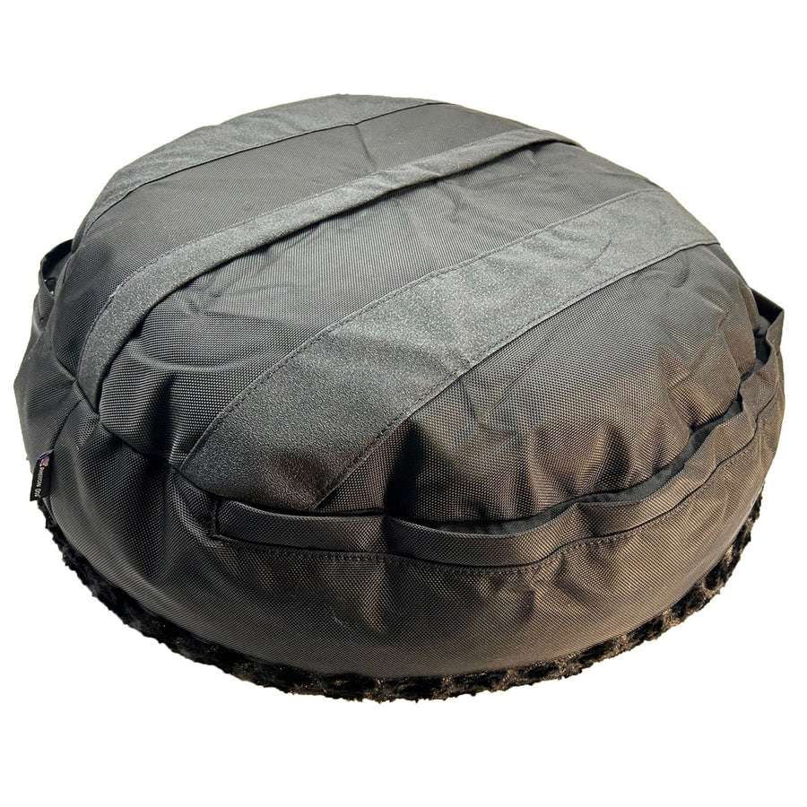 Bottom of black Furvana round dog bed showing non-skid strips