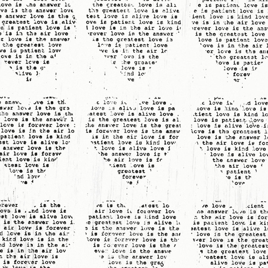 Love Is art print with a grid of text-filled hearts.