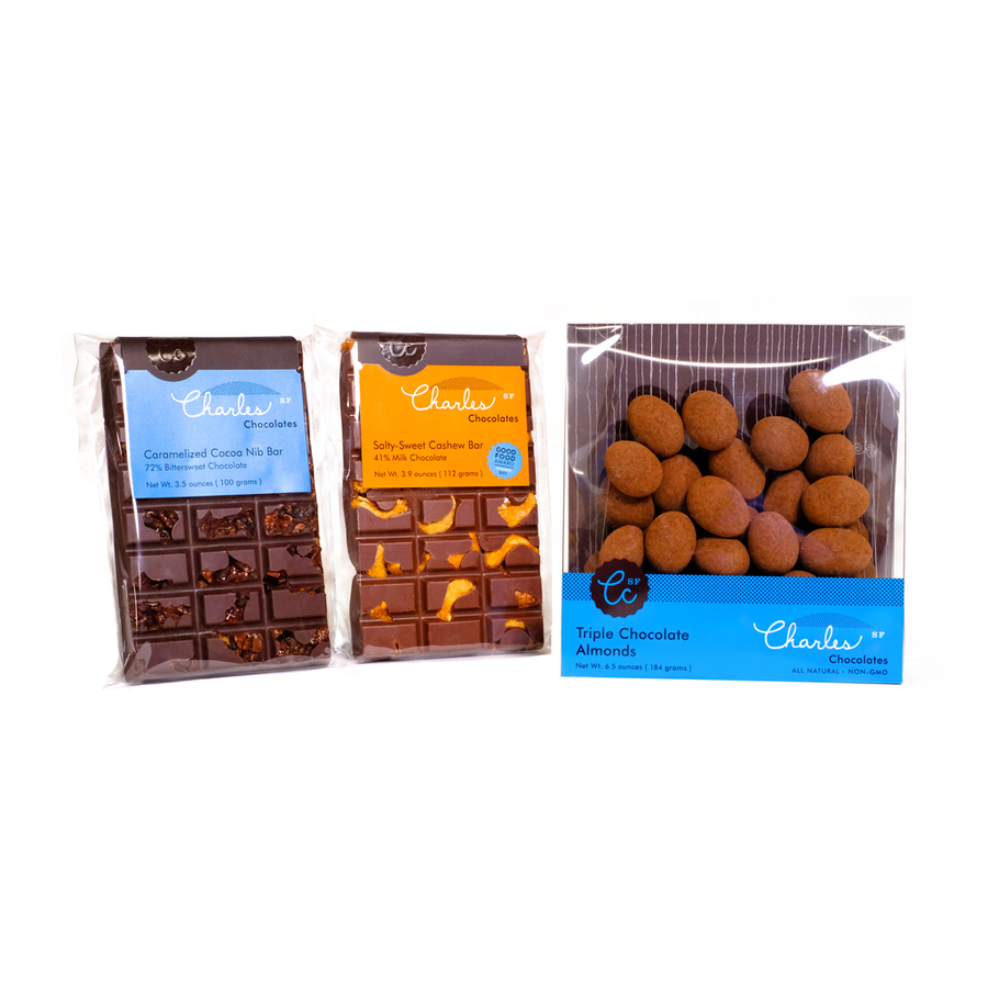 Three packaged products in the small artisan chocolate gift set