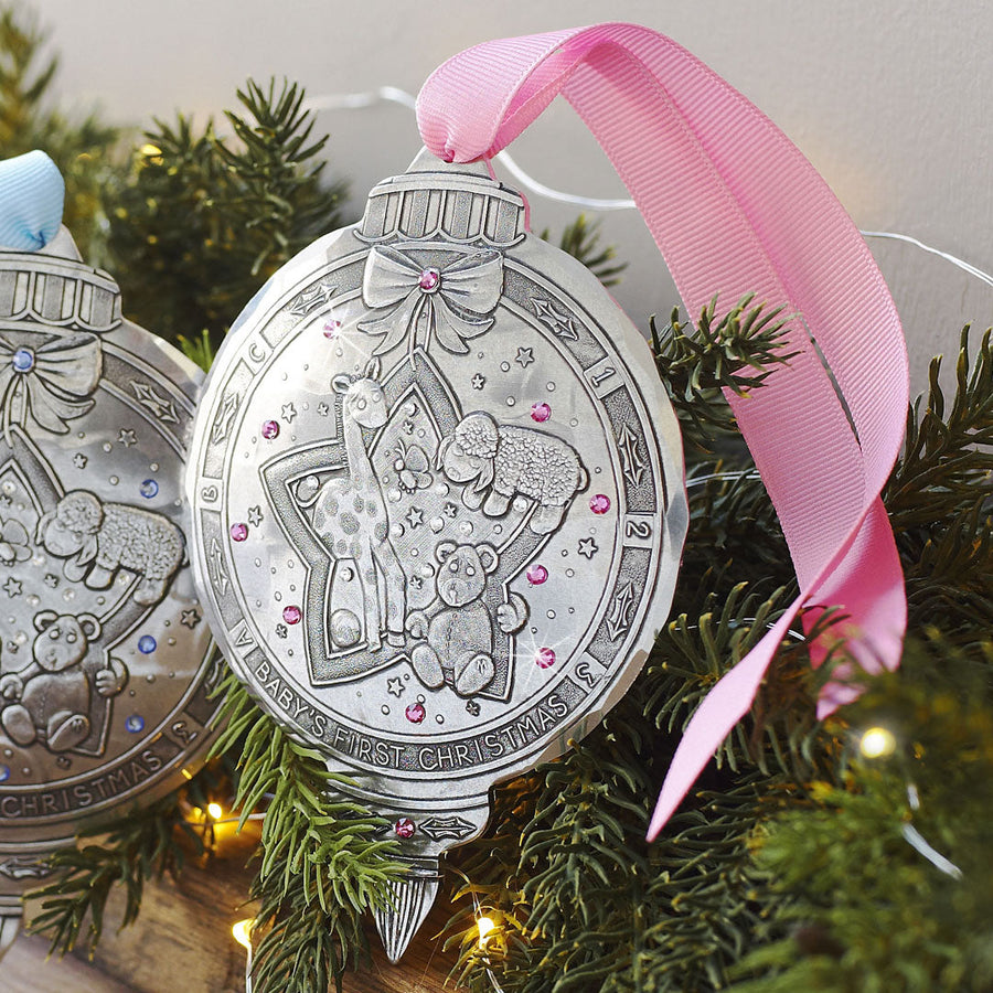 Collection display featuring Baby Girl’s First Christmas Ornament with Crystals