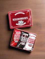 Beer & Bourbon Liquor Nuts Men's Gift Tin with Assorted Cashews, Peanuts, and Almonds on wooden table.