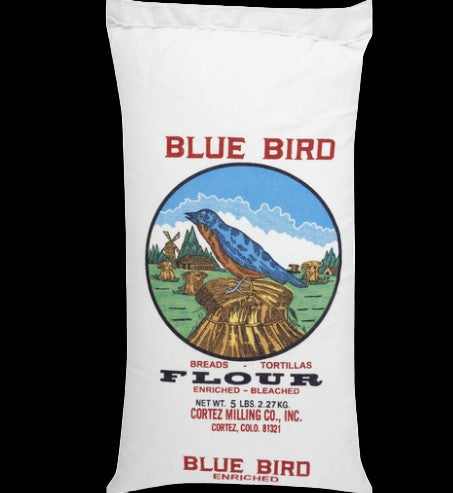 Blue Bird enriched bleached flour in a 5 lb cotton bag