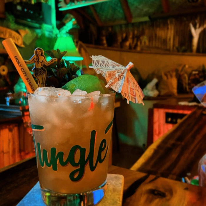 Holy City Straw Company branded reed straw in a tiki drink
