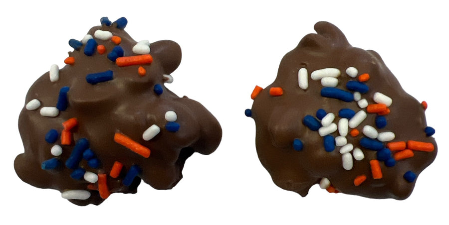 Bronco Bites Chocolate Caramel Peanut Bar — two unwrapped pieces with blue, orange and white sprinkles