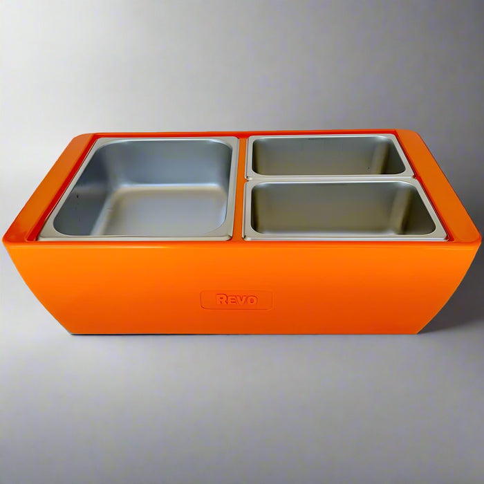 The Dubler HEAT is unique innovation as a flameless chafer and cooler combination that fits two 1/2 size food pans and up to 4” depth. The premium insulation, along with the heat packs and placing hot food trays straight from oven, provide a slow drop in temperature over time. Enjoy hot to eventually warm food for hours while the outside remains safe to touch for easy mobility.