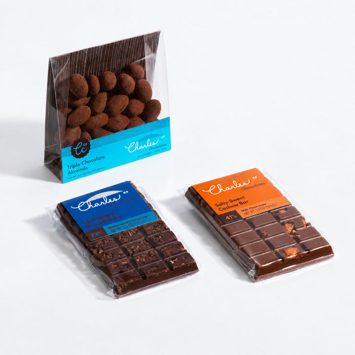 Small artisan chocolate gift set with coated almonds, cocoa nib bar, and cashew bar