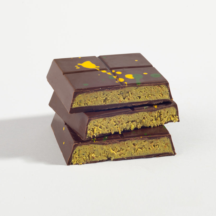Original Dubai Pistachio Chocolate Bar cut open to show its layered filling