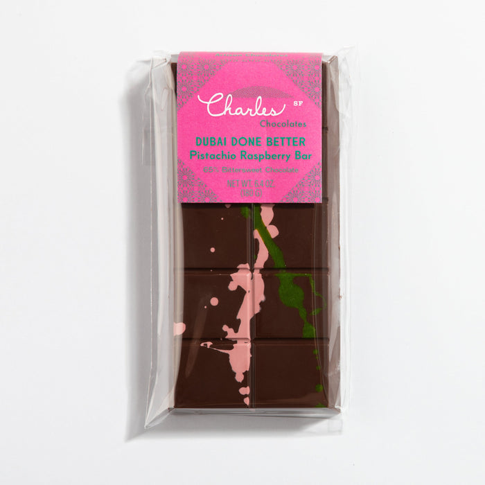 Raspberry Ganache Dubai Pistachio Chocolate Bar in labeled packaging