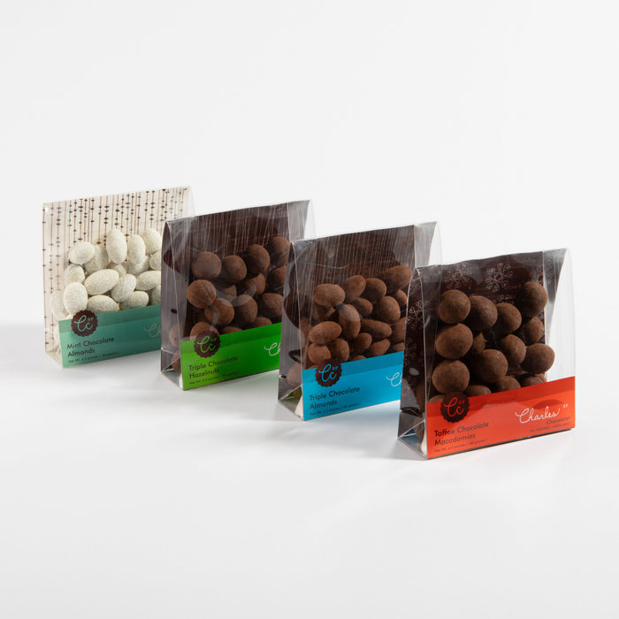 Four packaged varieties in the chocolate-covered nut collection