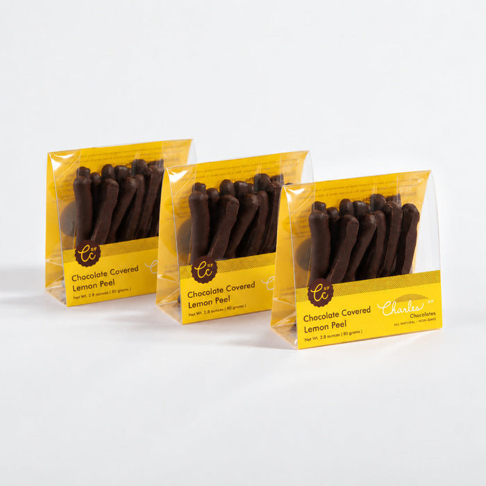 Three packages of dark chocolate-covered lemon peel