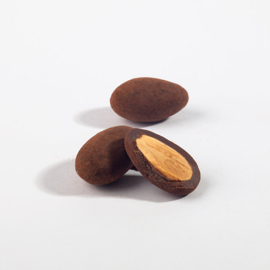 Triple Chocolate California Almonds, whole and halved to show the nut center