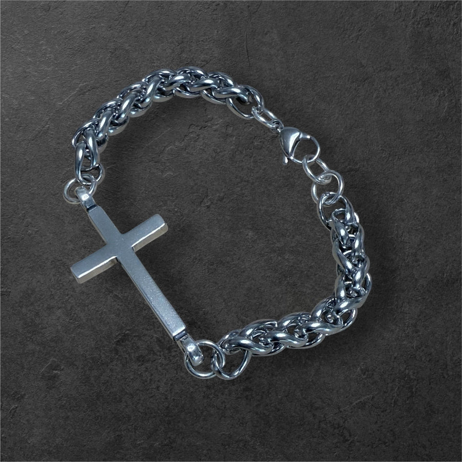 Classic Cross bracelet arranged on a dark background
