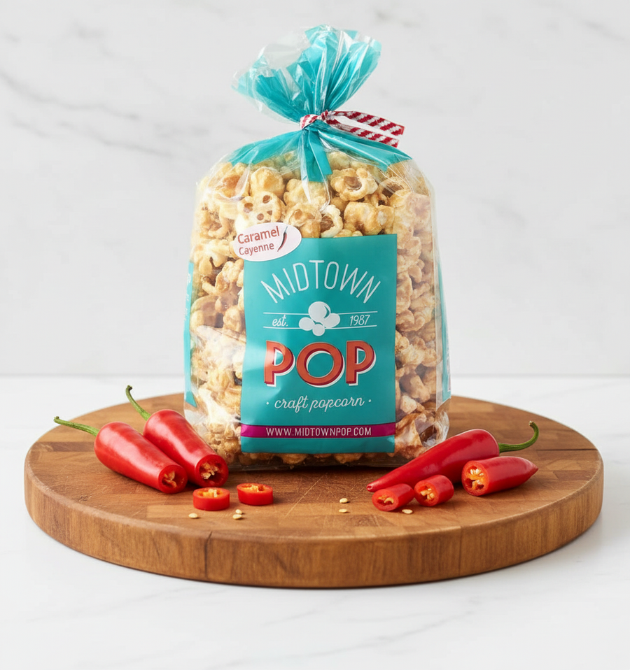 Caramel cayenne popcorn bag displayed with red peppers