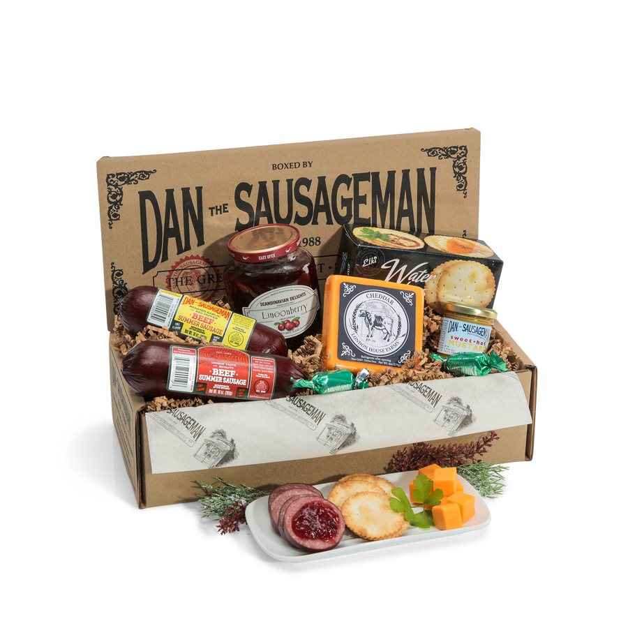 Skandia gift box with two summer sausages, smoked Gouda, lingonberry spread, mustard, crackers and candy