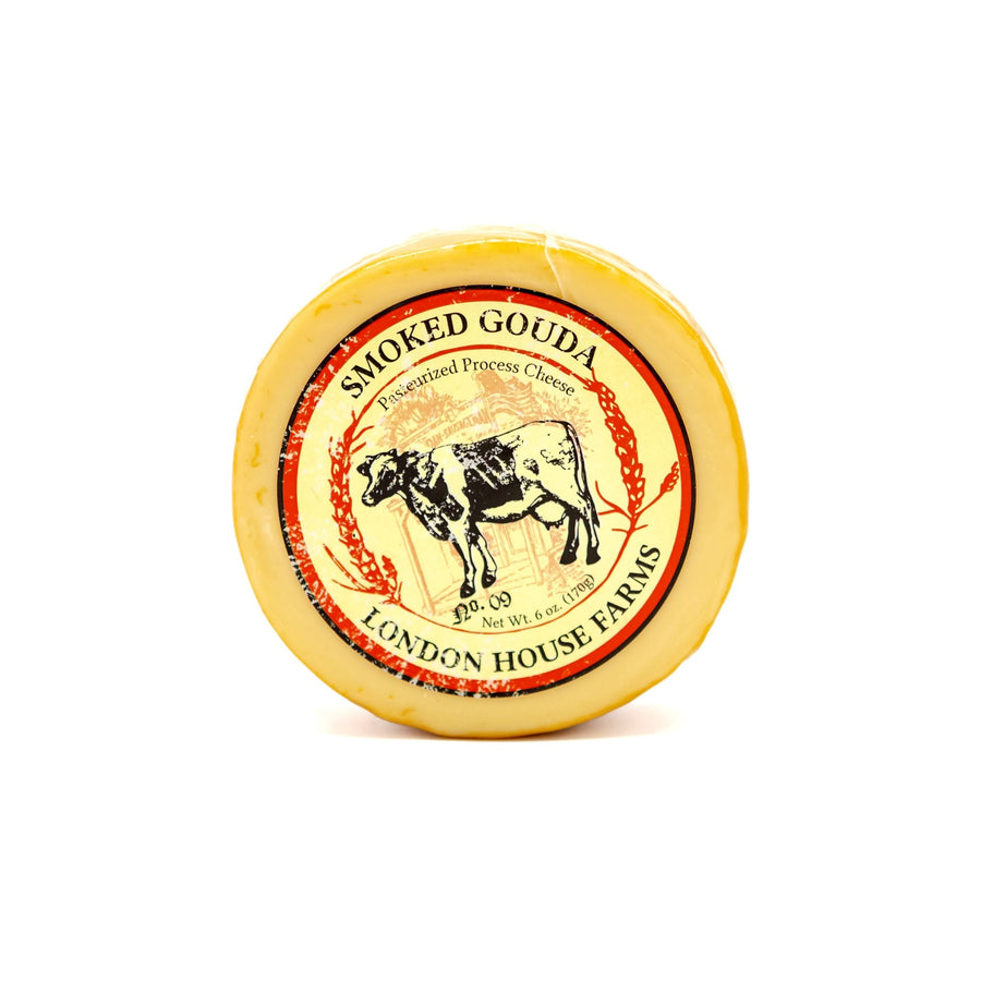 London House Farms smoked Gouda cheese round with illustrated cow label